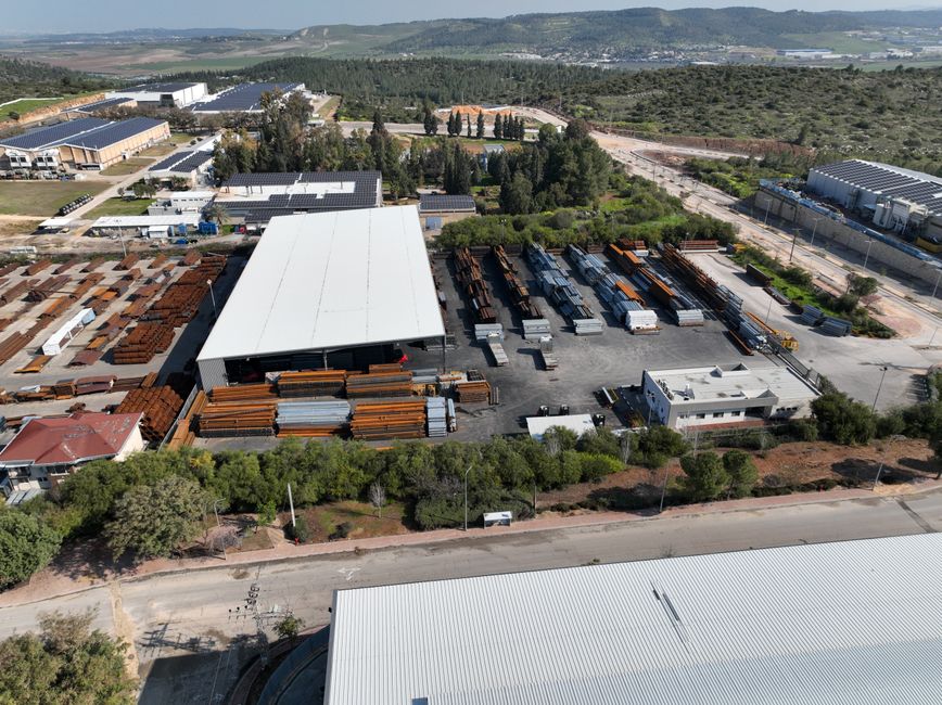 Aerial view of a large industrial facility with steel storage and warehouses. (Photo: Pexels User / Pexels)
