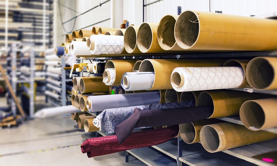Rows of textile rolls stored in a factory for industrial manufacturing. (Photo: Pixabay / Pexels)